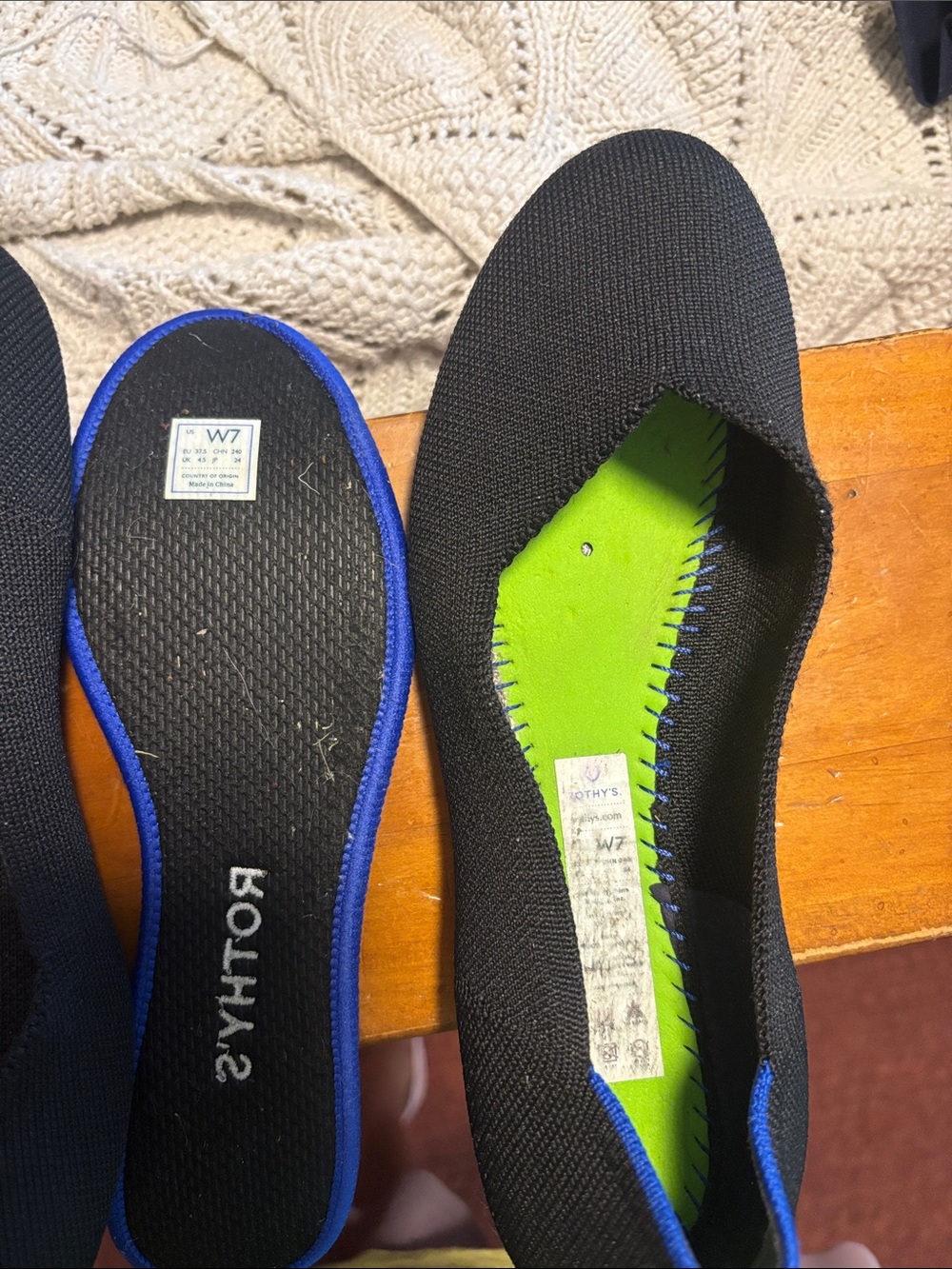 Rothy's Women’s Black Ballet Flat with Blue Trim - Picture 2 of 5